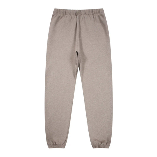 Jogger style heathered grey sweatpants by Fear of God with elastic waistband