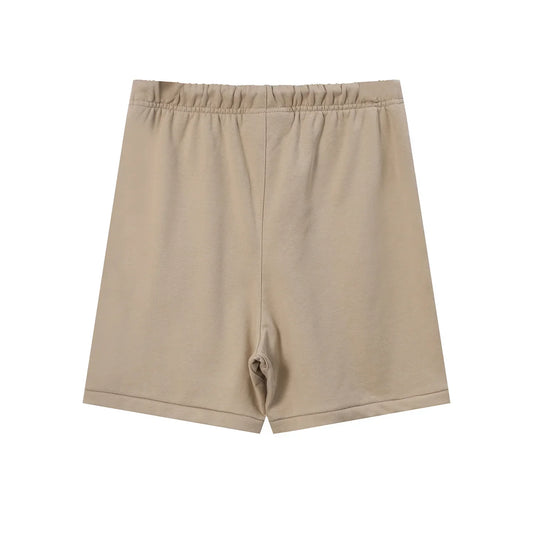 Fear of God Essentials Calm Shell fleece shorts relaxed fit side view