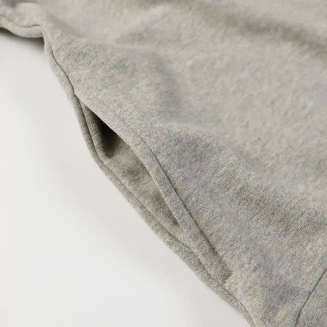 Fear of God Essentials dark heather oatmeal hoodie hood label detail