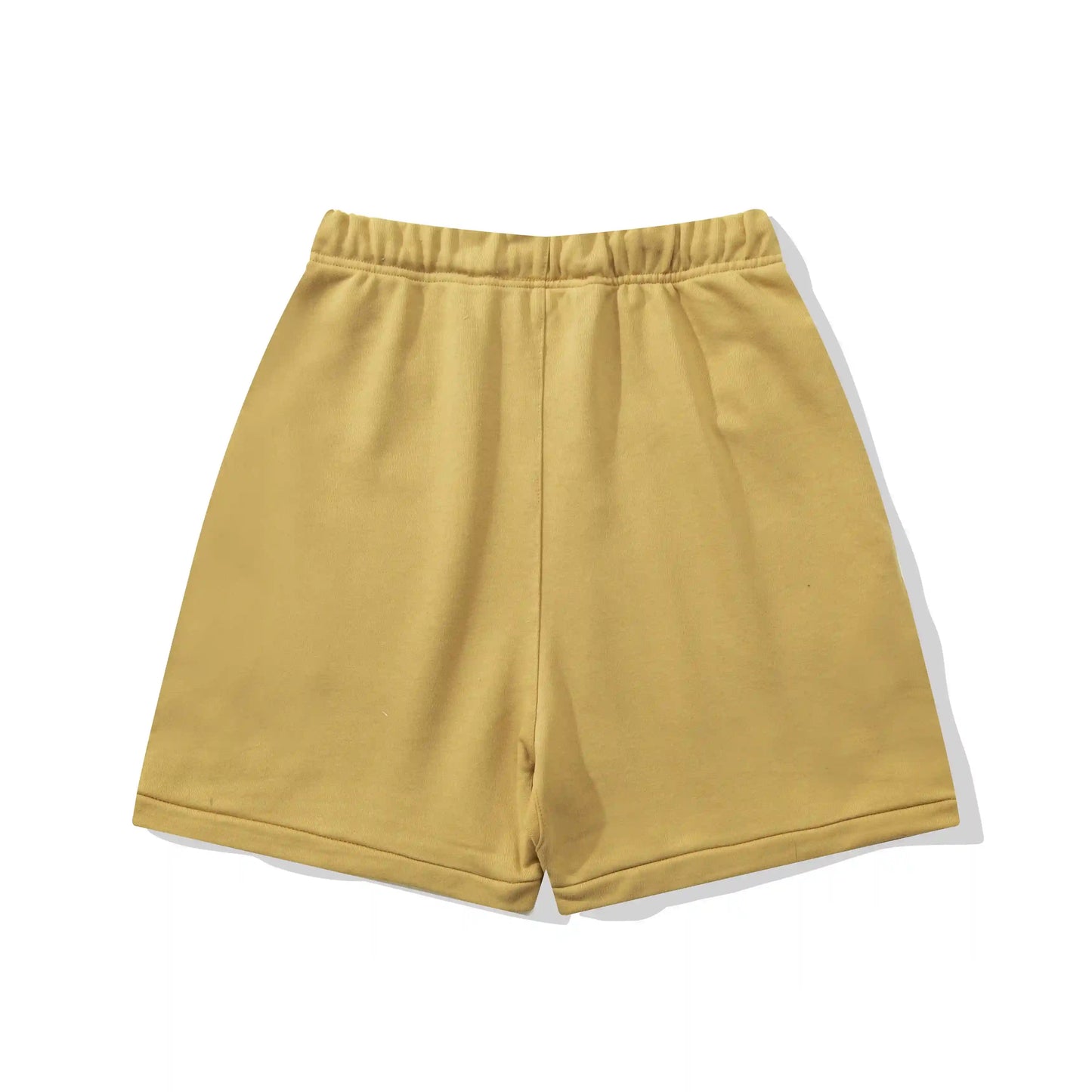 Fear of God Essentials Garden Yellow fleece shorts with tonal branding and relaxed streetwear fit