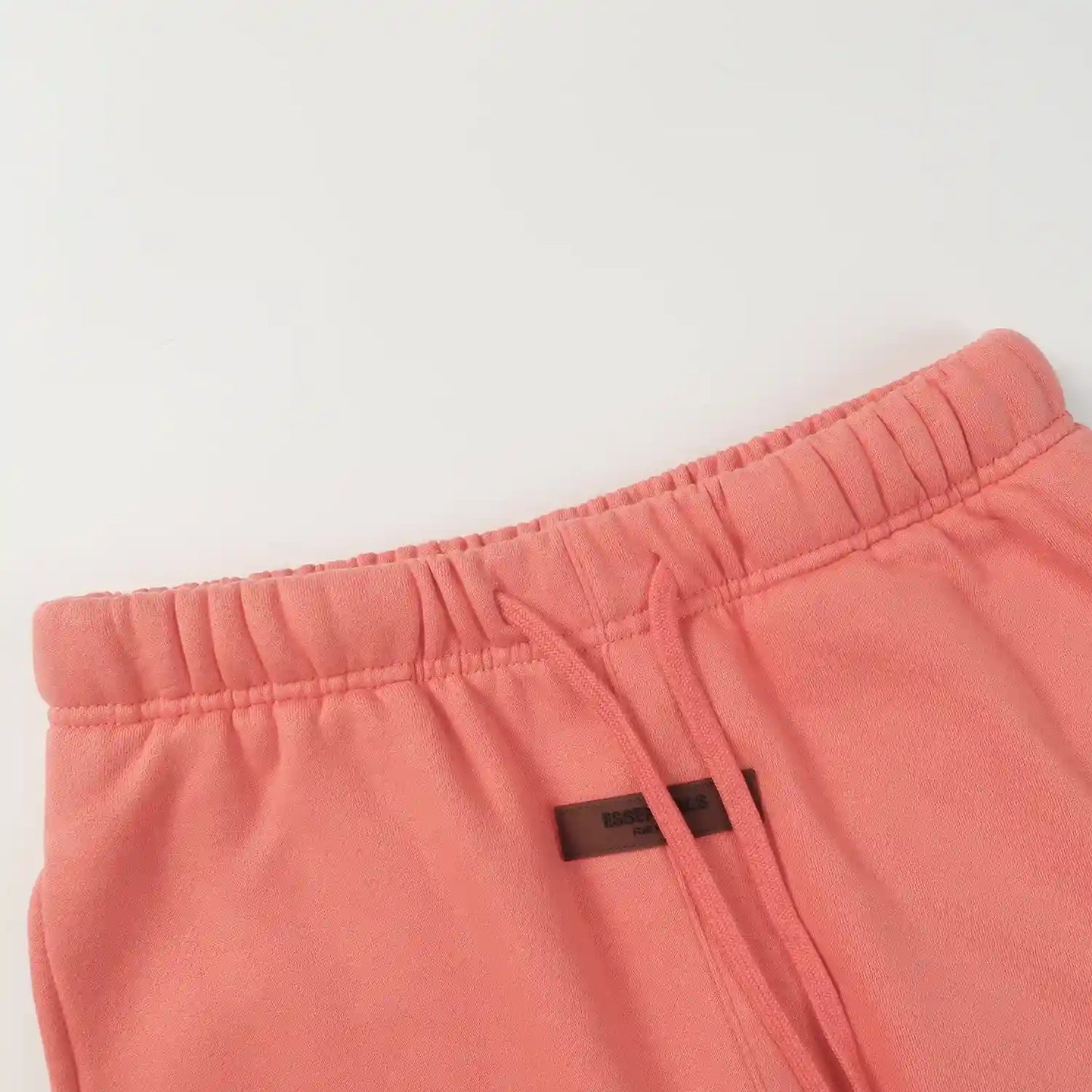Essentials casual streetwear coral sweatpants by Fear of God outfit