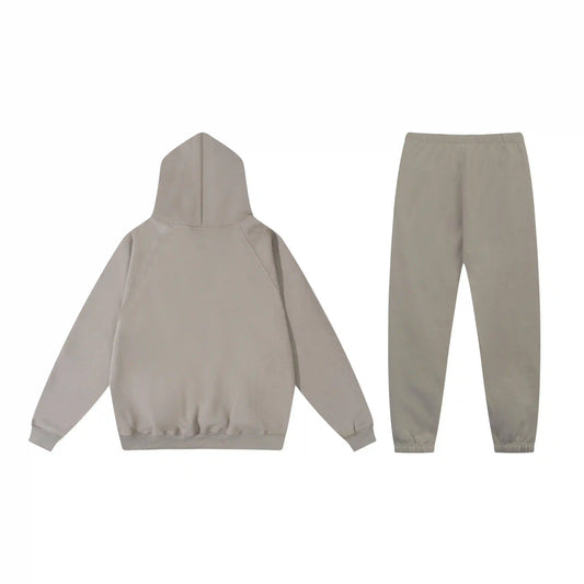 Essentials heathered grey fleece hoodie with soft interior detail by Fear Of God