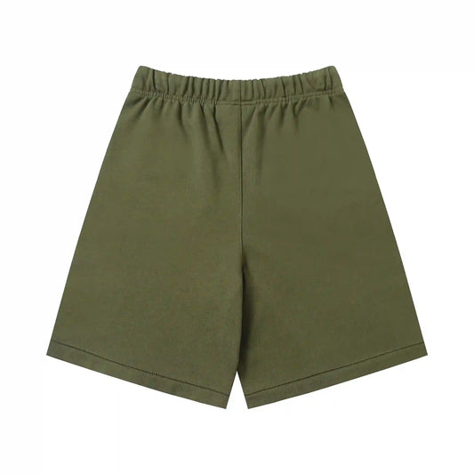 Fear of God Essentials Hemlock green fleece shorts with tonal branding and long drawstrings