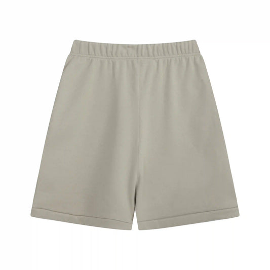 Fear of God Essentials pastel grey fleece shorts with tonal branding and relaxed fit