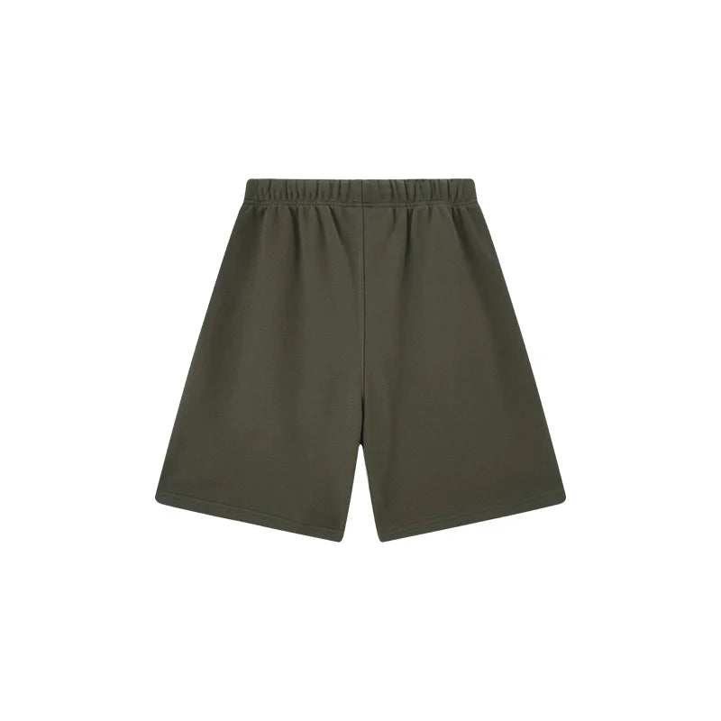 Fear of God Essentials Hemlock green fleece shorts with tonal logo and oversized fit