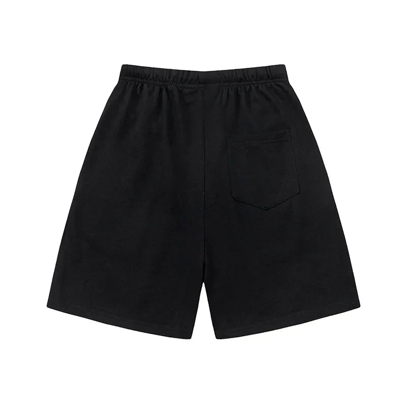 Fear of God Essentials Black fleece shorts relaxed fit side view