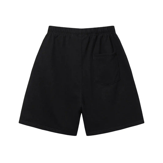 Fear of God Essentials Black fleece shorts relaxed fit side view