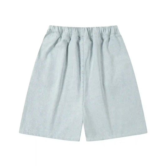 Fear of God Essentials denim blue fleece shorts with tonal logo and relaxed vintage fit