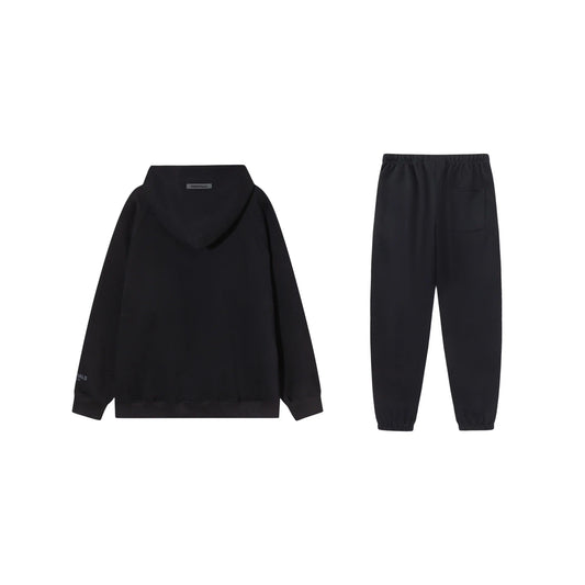Essentials tracksuit black full set angled view relaxed fit