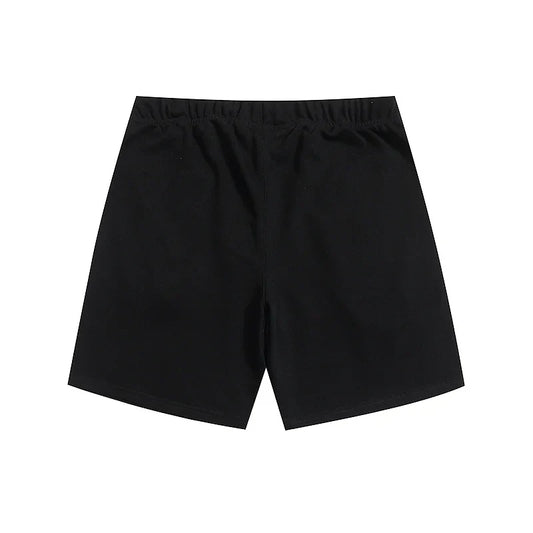 Fear of God Essentials Black fleece shorts relaxed fit side view