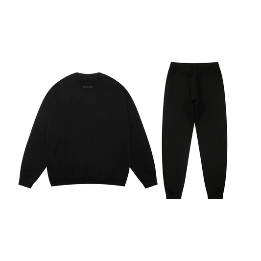 Essentials black core comfort fleece hoodie with soft interior detail by Fear Of God