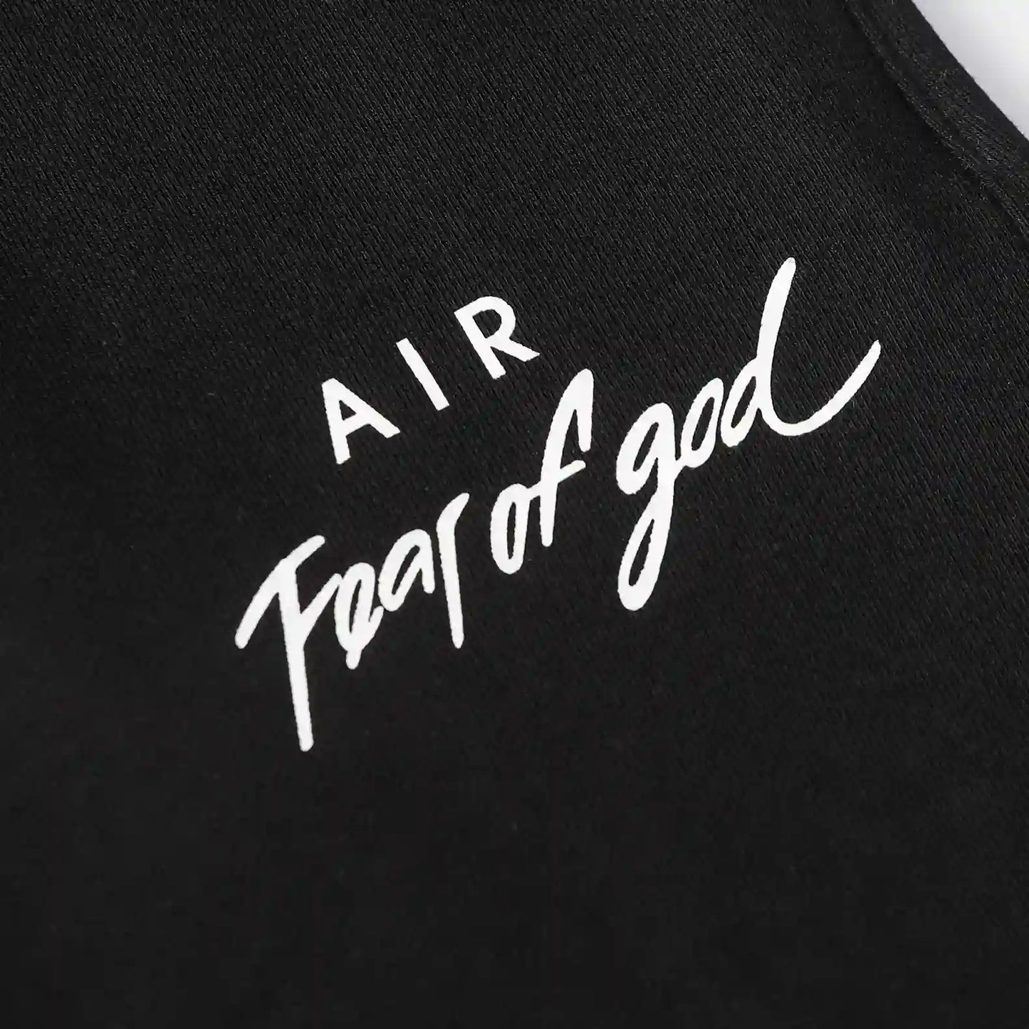 Jogger style black sweatpants by Fear of God with elastic waistband