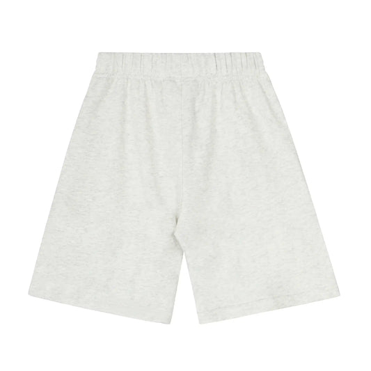 Fear of God Essentials Cloud Dance fleece shorts in white with tonal branding and relaxed silhouette