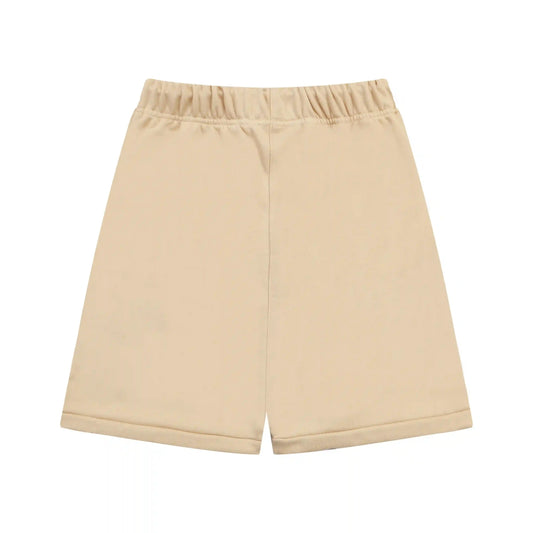 Fear of God Essentials Calm Shell beige fleece shorts with tonal branding and drawcords