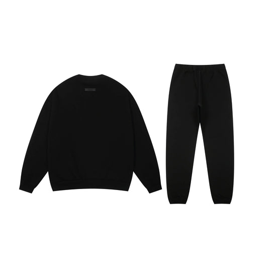 Essentials black core casual fleece hoodie with soft interior detail by Fear Of God