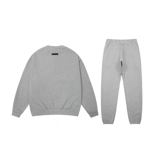 Essentials tracksuit dark heather oatmeal angled view relaxed fit crewneck set