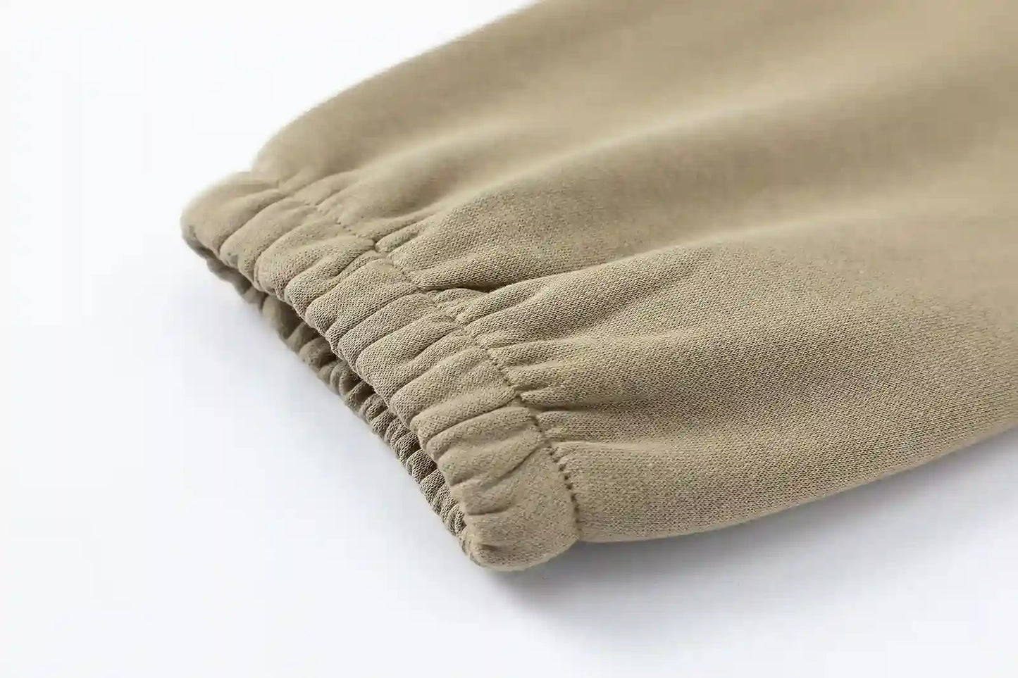 Ribbed ankle cuffs and side pocket detail on sweatpants by Fear Of God