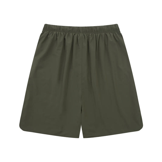 Fear of God Essentials hemlock green fleece shorts with tonal logo and relaxed fit