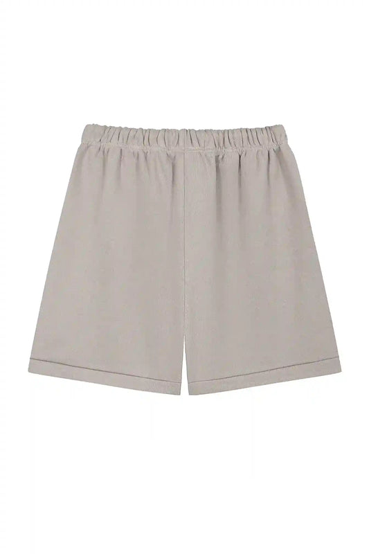 Fear of God Essentials dark heather oatmeal fleece shorts with tonal branding and relaxed streetwear fit