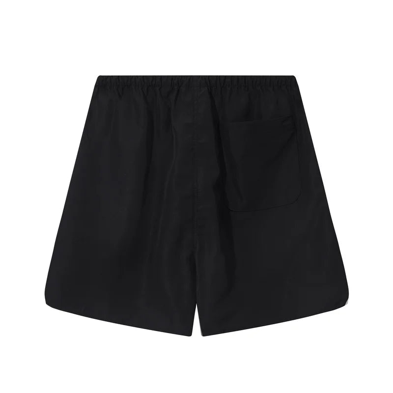 Fear of God Essentials Black fleece shorts relaxed fit side view