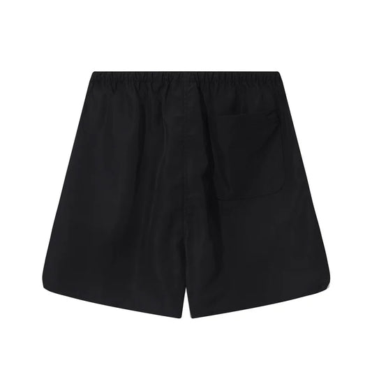 Fear of God Essentials Black fleece shorts relaxed fit side view