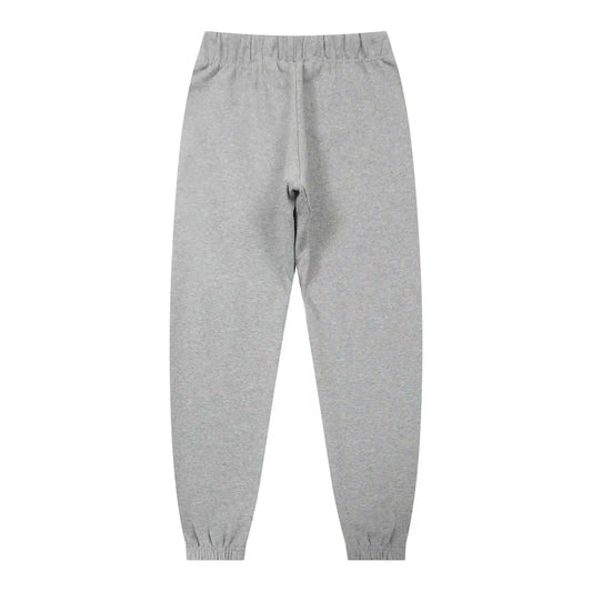 Ribbed ankle cuffs and side pocket detail on dark heather oatmeal sweatpants by Fear of God