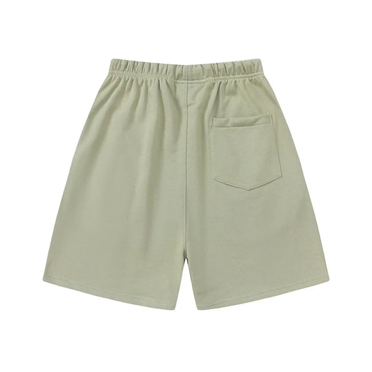 Fear of God Essentials Pavlova fleece shorts in beige with tonal logo and drawstrings