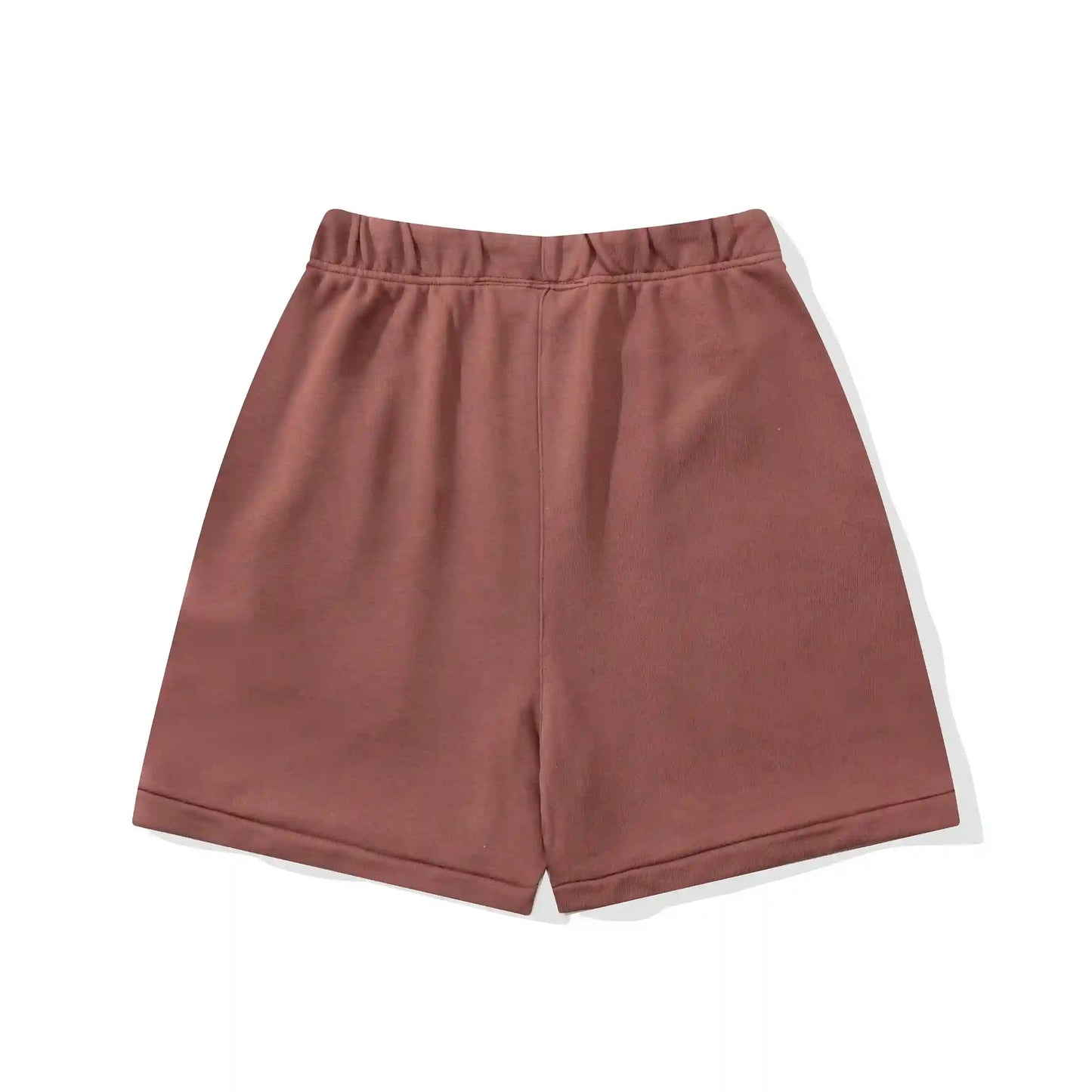 Fear of God Essentials Dark Chestnut fleece shorts with tonal logo and relaxed streetwear silhouette