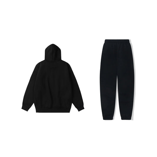 Essentials black lounge core fleece hoodie with soft interior detail by Fear Of God