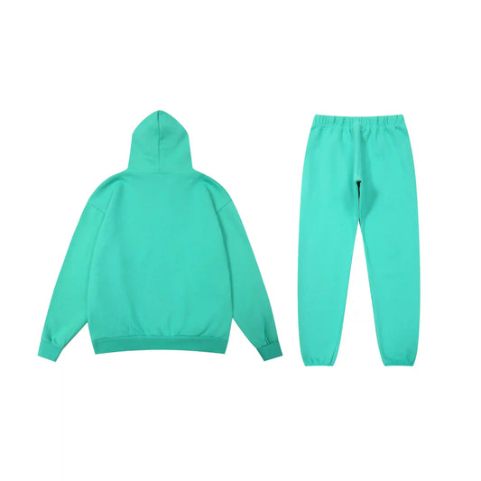 Essentials tracksuit aqua green full set angled view relaxed fit