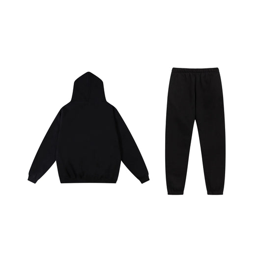 Essentials tracksuit black full set angled view relaxed fit