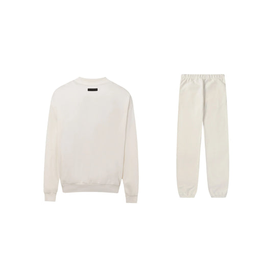 Essentials tracksuit cloud dance full set angled view relaxed fit