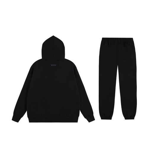 Essentials black core fleece hoodie with soft interior detail by Fear Of God