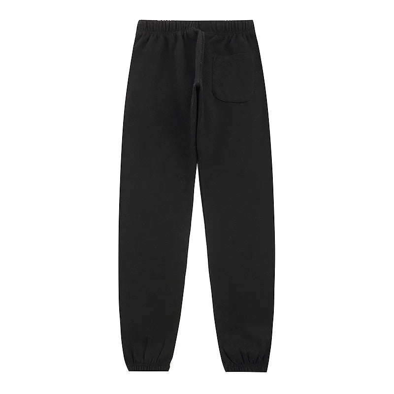 Essentials black fleece joggers with elastic waistband comfort by Fear Of God