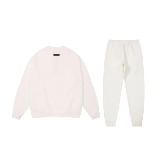 Essentials eggshell fleece hoodie with soft interior detail by Fear Of God