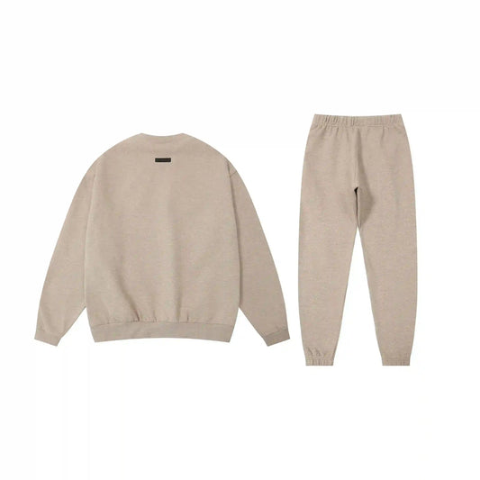 Essentials heathered grey fleece hoodie with soft interior detail by Fear Of God