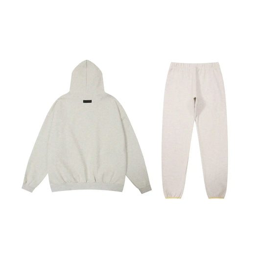 Essentials light oatmeal fleece hoodie with soft interior detail by Fear Of God