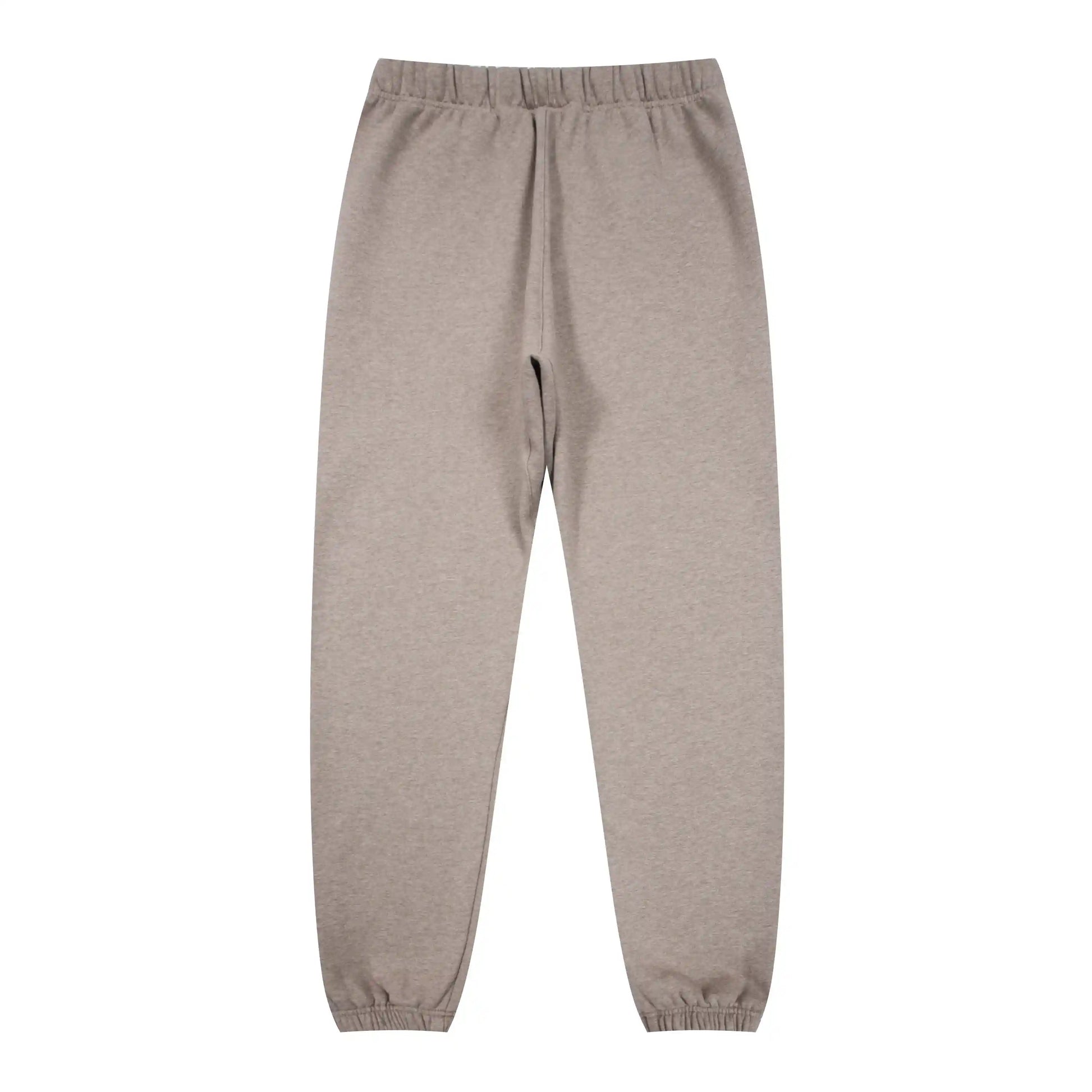 Jogger style heathered grey sweatpants by Fear of God with elastic waistband