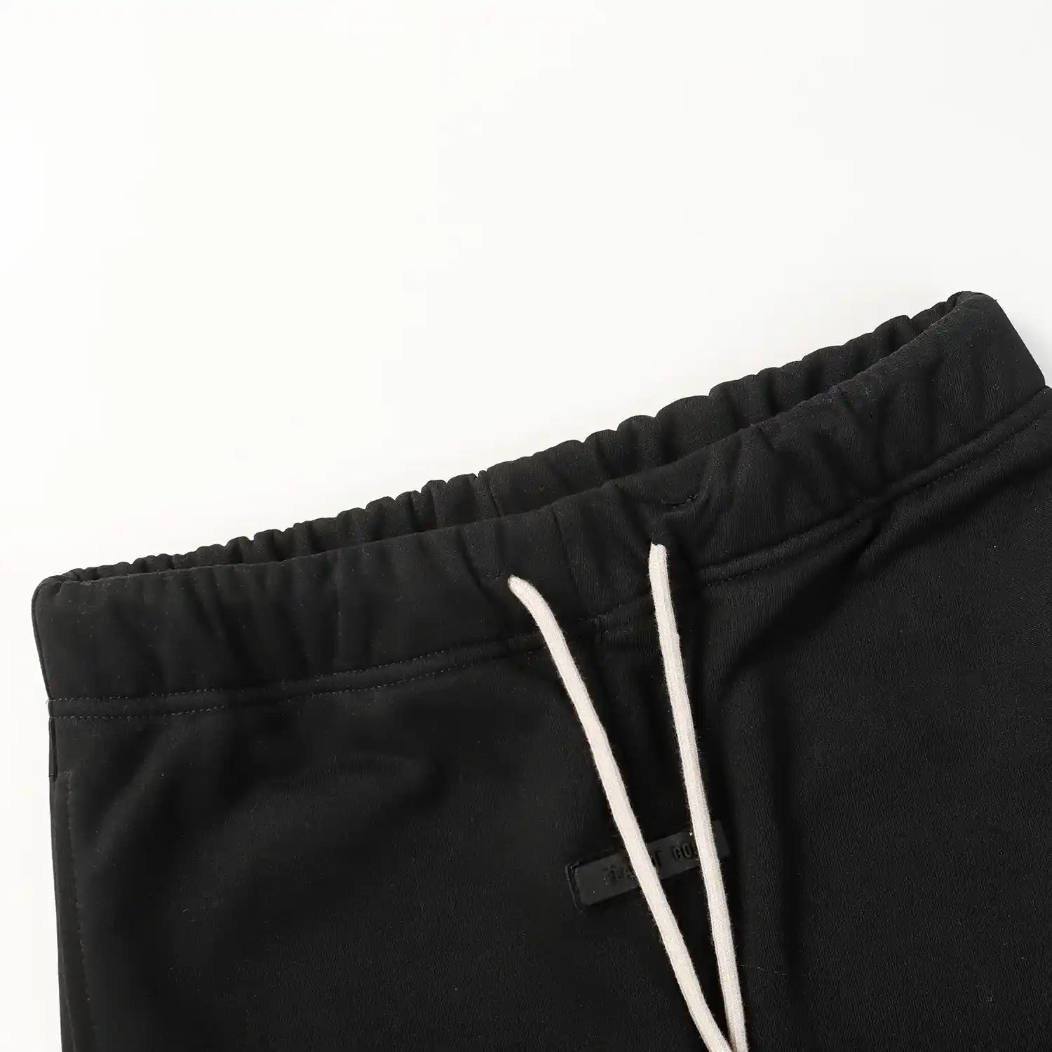 Premium fleece fabric detail on black sweatpants by Fear of God