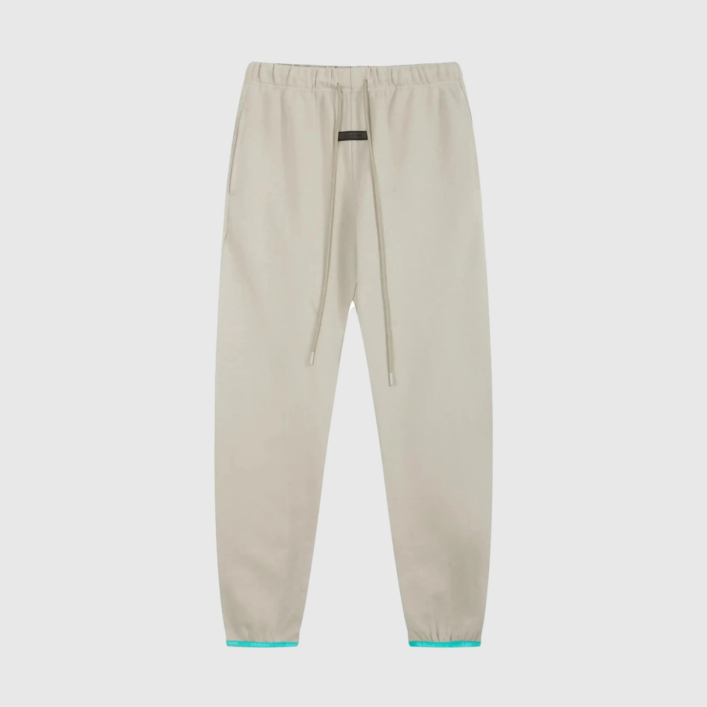 Essentials light cream street sweatpants by Fear of God front view