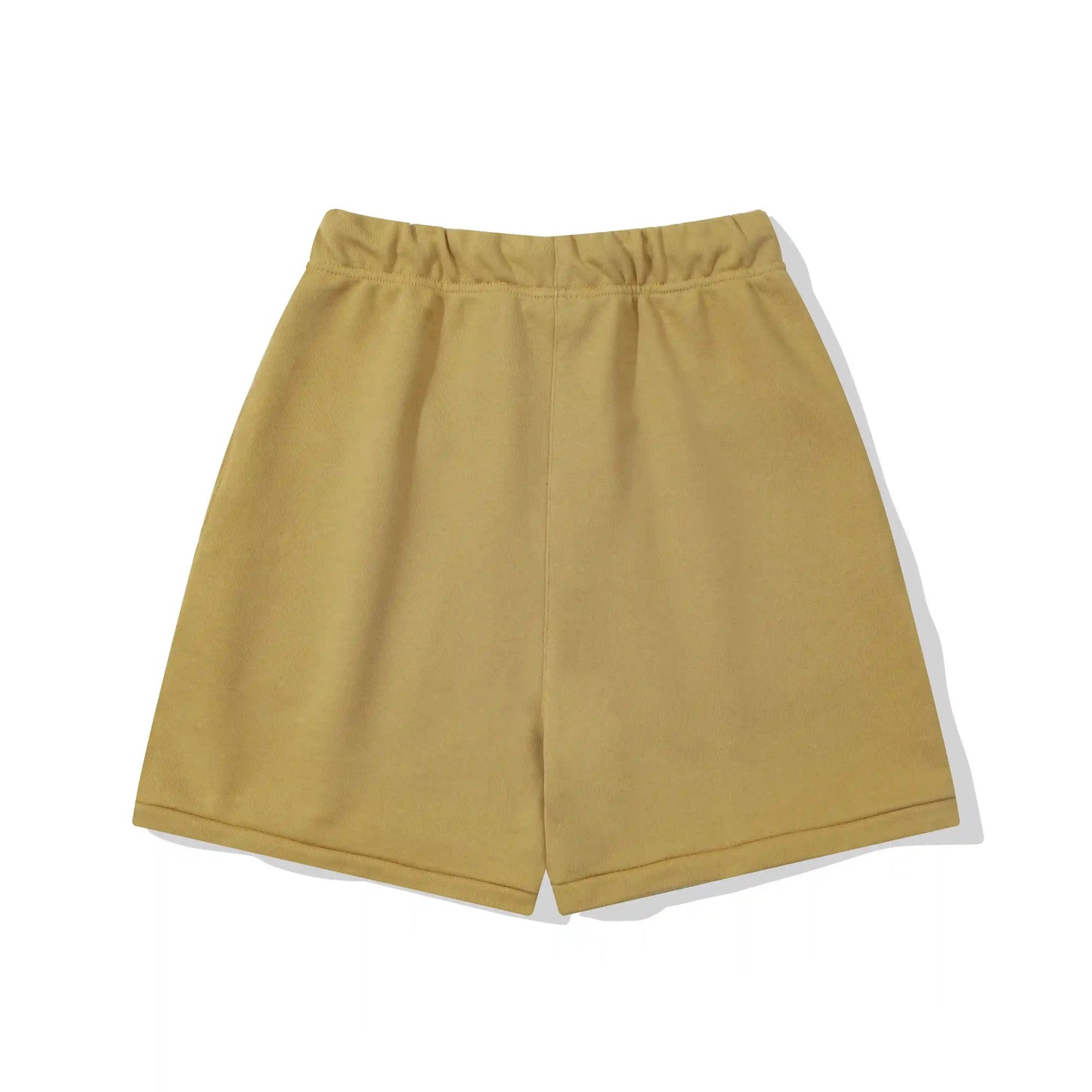 Fear of God Essentials Garden Yellow fleece shorts with tonal logo and relaxed streetwear fit
