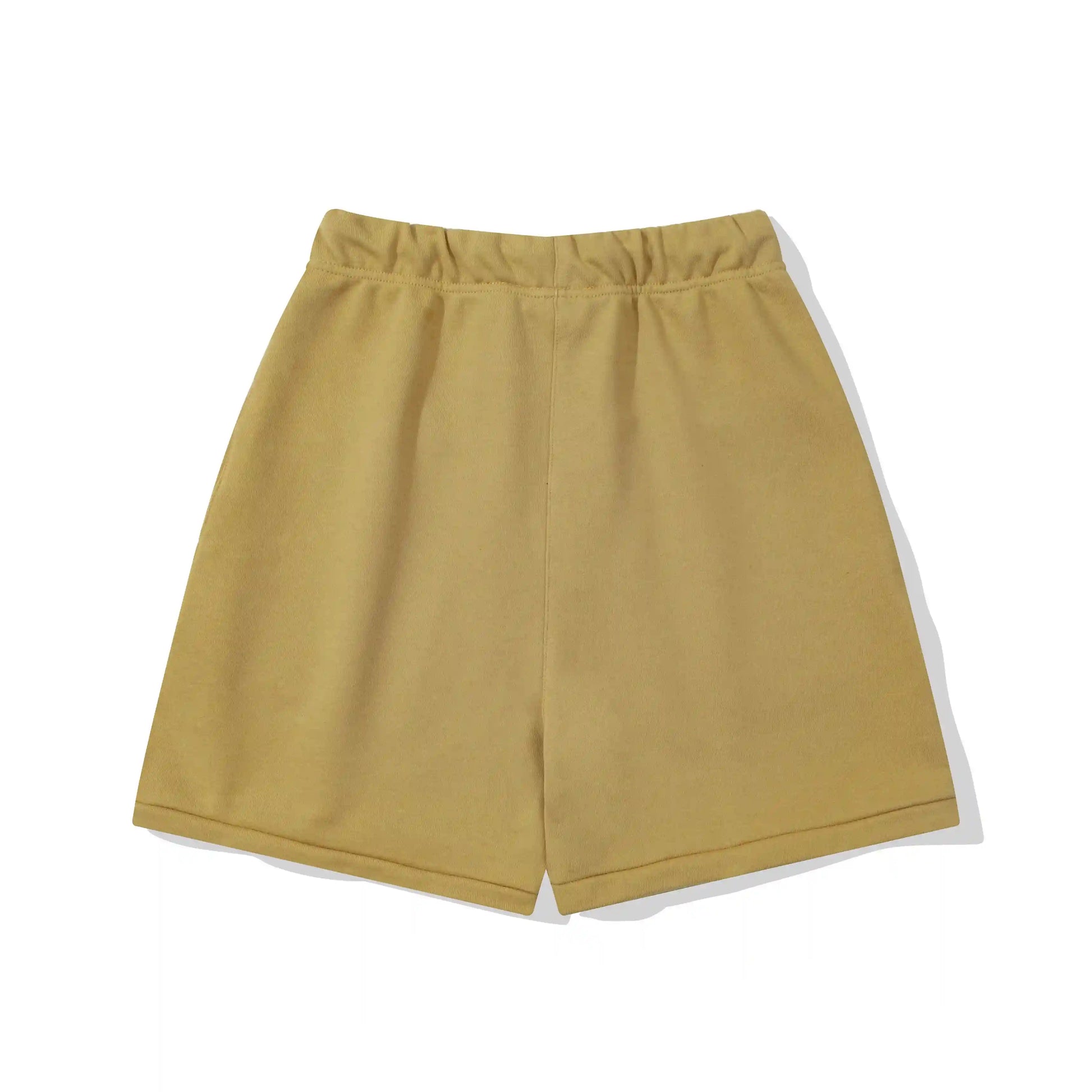 Fear of God Essentials Garden Yellow fleece shorts with tonal logo and relaxed streetwear fit
