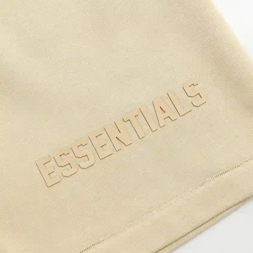 Fear of God Essentials Calm Shell Shorts in beige fleece with drawstring waistband