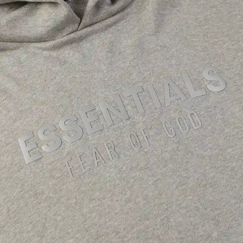 Fear of God Essentials dark heather oatmeal hoodie hood label detail
