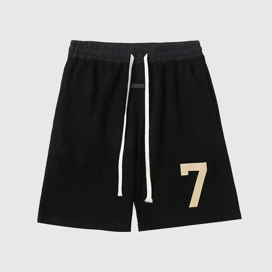 Fear of God Essentials black fleece shorts with tonal branding and modern relaxed fit