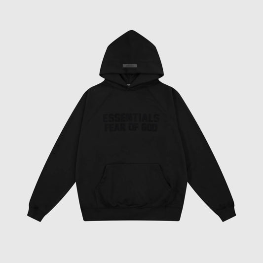 Fear of God Essentials black hoodie front view with rubberized front bar branding