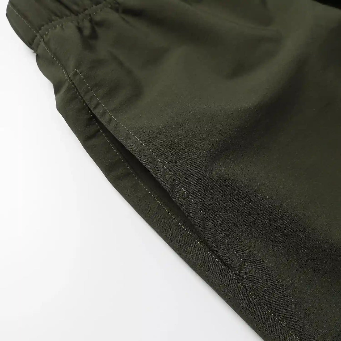 Fear of God Essentials Hemlock green fleece shorts with tonal logo and drawstring waistband
