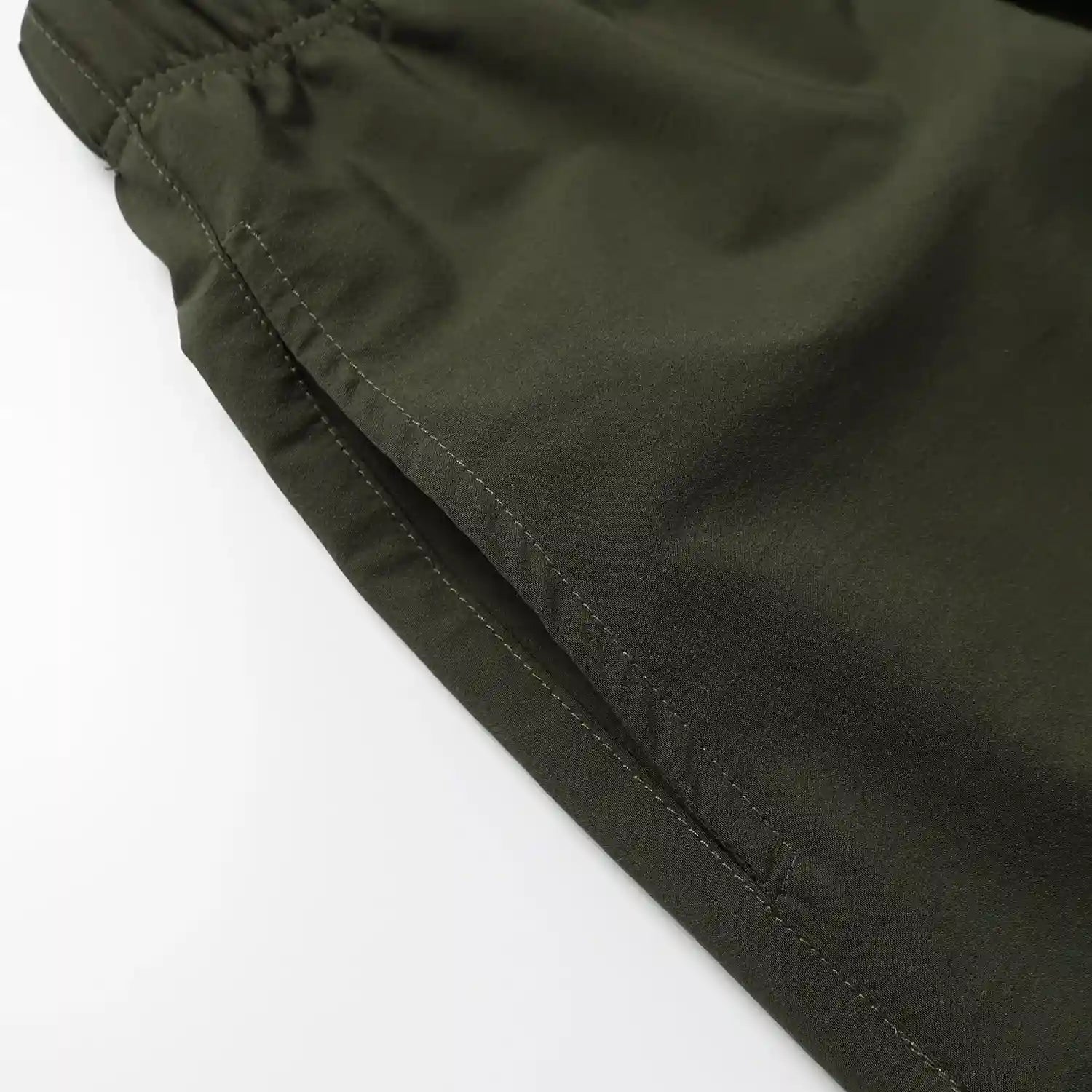 Fear of God Essentials Hemlock green fleece shorts with tonal logo and drawstring waistband