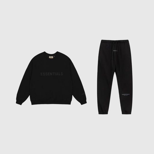 Essentials black core streetwear fleece tracksuit set with relaxed fit by Fear Of God

