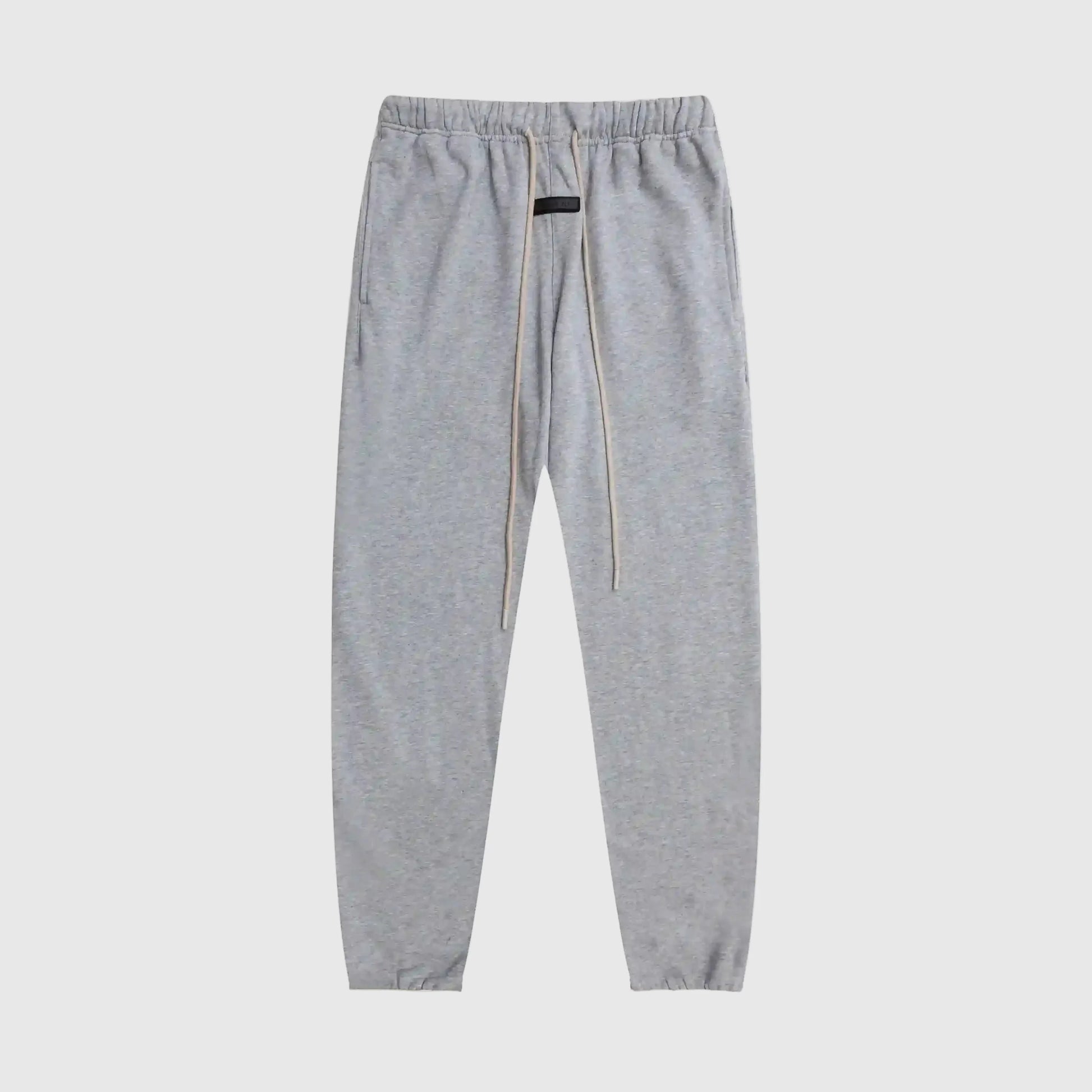 Cozy fleece fabric detail on dark heather oatmeal sweatpants by Fear Of God